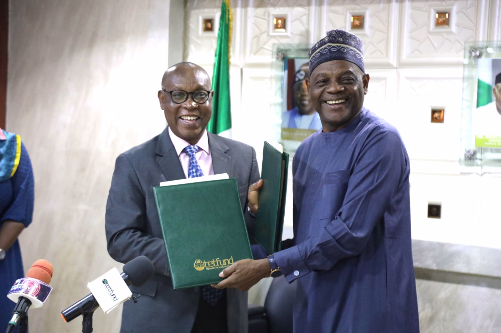 Executive Secretary, Nigerian Extractive Industries Transparency Initiative, (NEITI), Dr Orji Ogbonnaya Orji, (left), and the Executive Secretary of the Tertiary Education Trust Fund, (TETFUND), Arc Sonny Echono, FNIA, OON at the TETFUND Headquarters, Abuja recently
